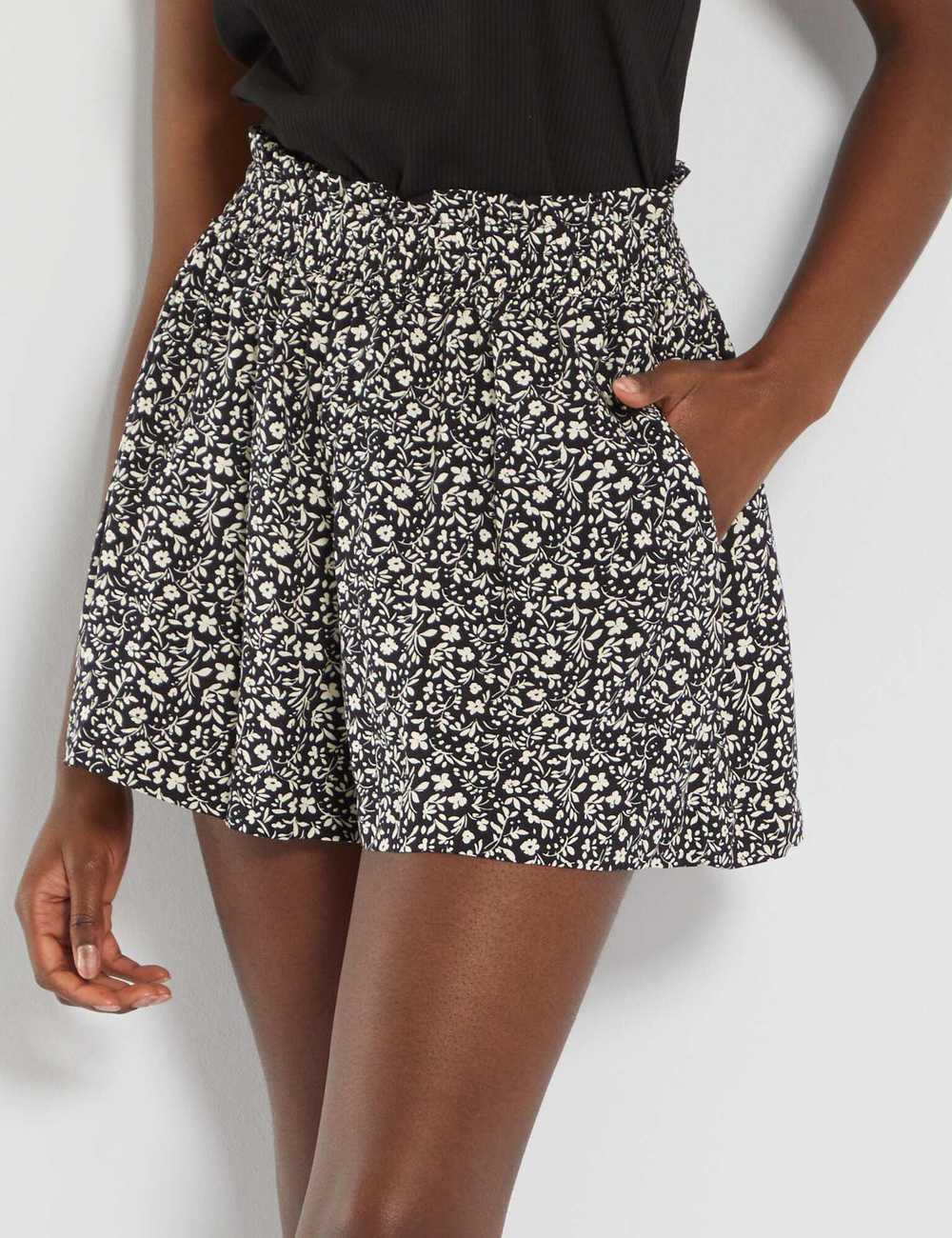 Black flower flowing shorts that look like skirt